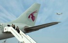 Despite the recent worldwide grounding of Boeing 787 Dreamliners, of which Qatar Airways recently purchased 10, the airline continues to dominate the regional and international aviation industry, though maintaining this position may become more challenging in coming years as regional and international competition increases. (Image Corbis)