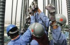 Labourers working at a construction site in Doha. The worker welfare charter, released by Qatar 2022 Supreme Committee in February, proposes reforms for migrant workers over a 50-page document. (Image Reuters/Arabian Eye)